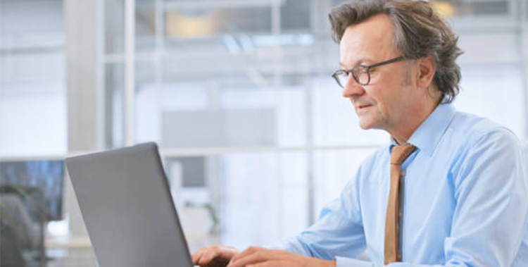 man on a computer